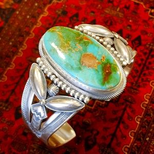 Navajo Turquoise and Sterling cuff bracelet with the artist mark.